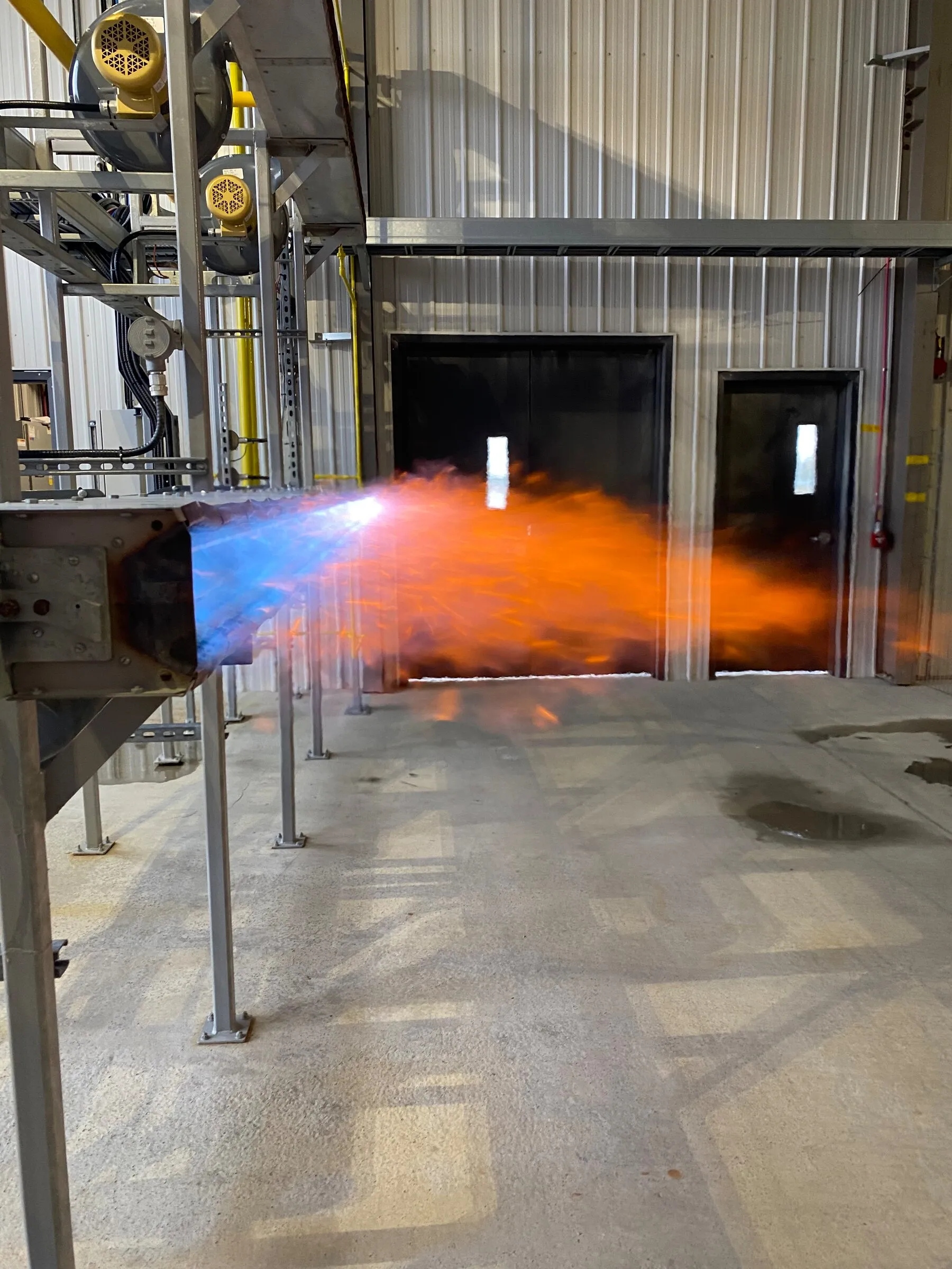 Mine air heater burner on test fire in Val-d'Or, Québec, flame at full rate
