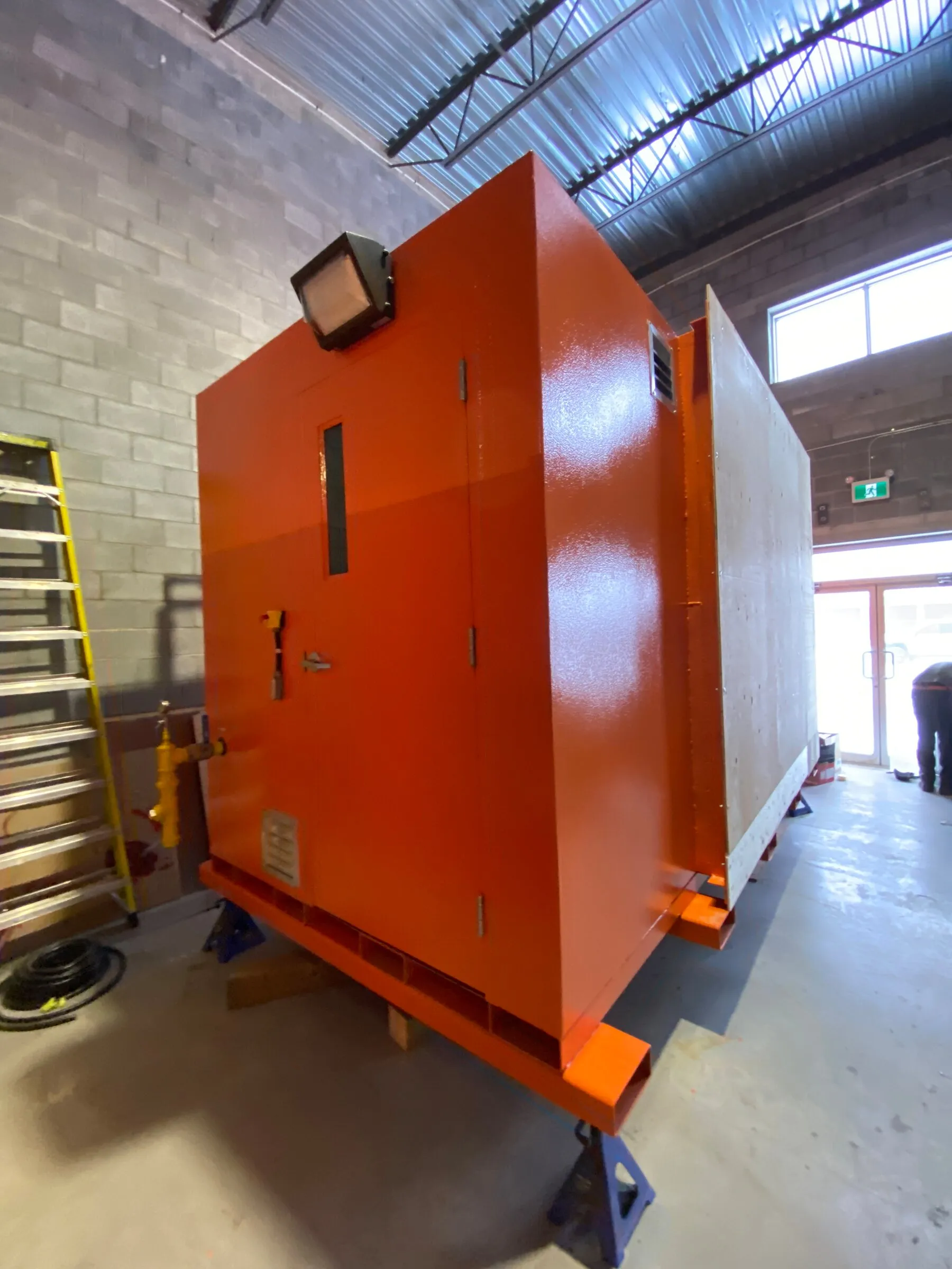 Direct-fired mine air heater in BCE Combustion's Gatineau shop, part-crated for shipping