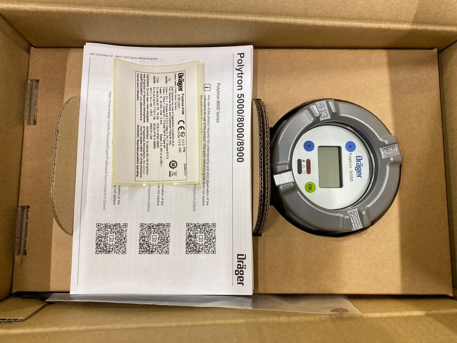 Dräger Polytron 5000 gas detector transmitter boxed with its quick reference guide